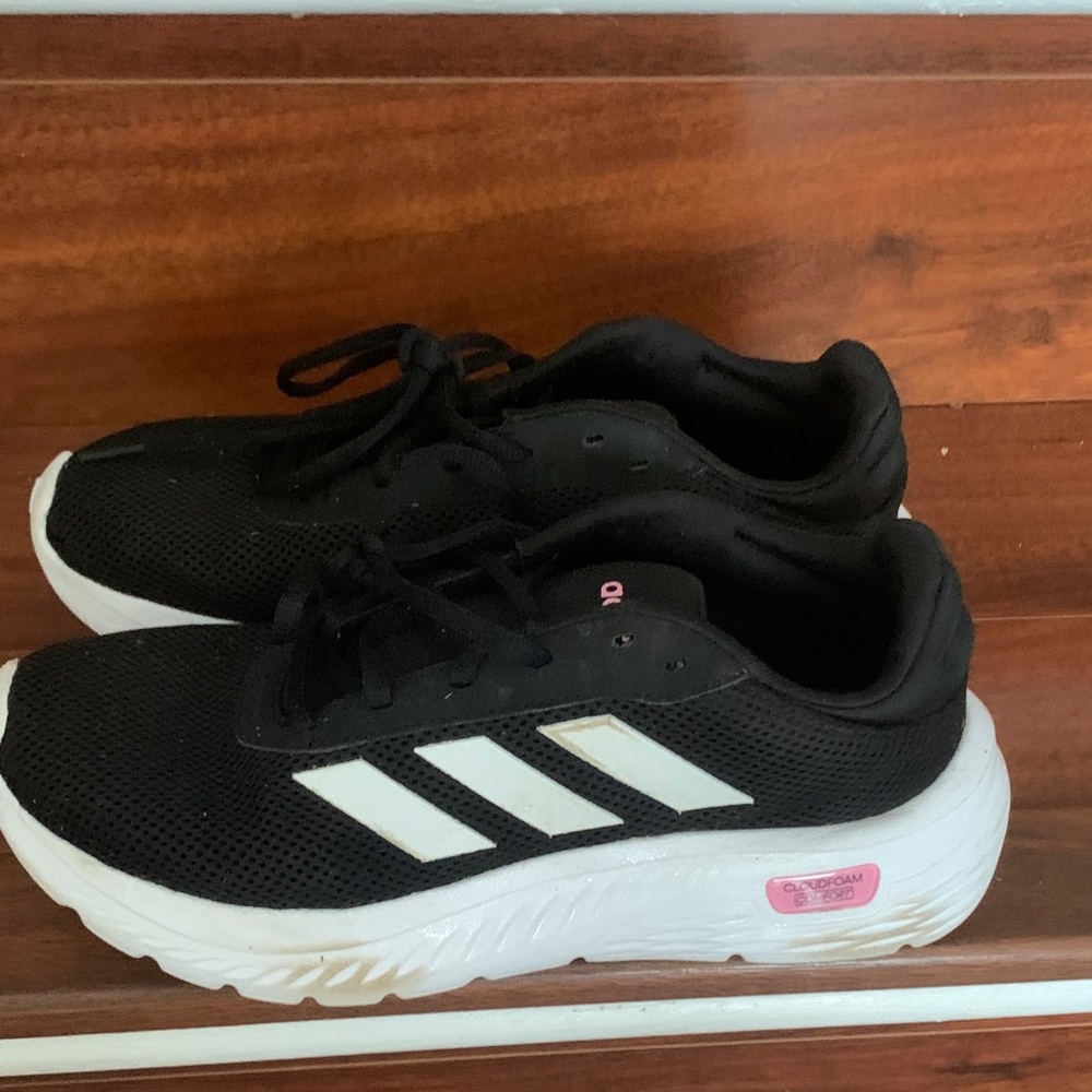 Adidas women’s Black and White Sneakers with Pink Accents